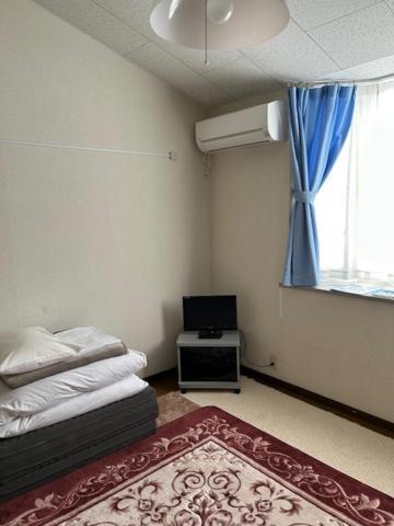 โตยาโกะ นิชิยามะ เพทิท โฮเต็ล โคอิซูมิ Hostel Toyako ภายนอก รูปภาพ
